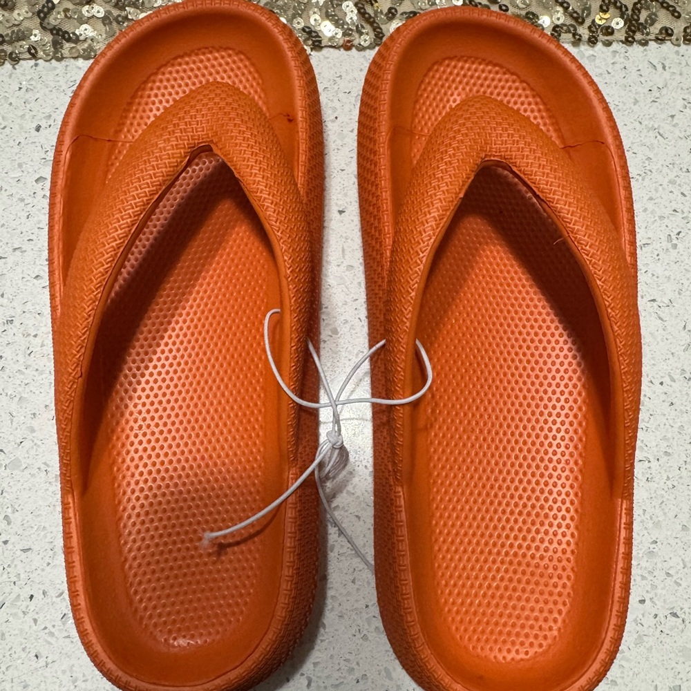 Bright Orange Flip Flops